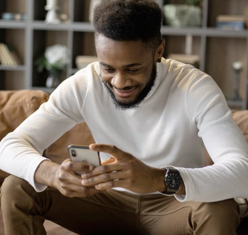 image showing a man texting